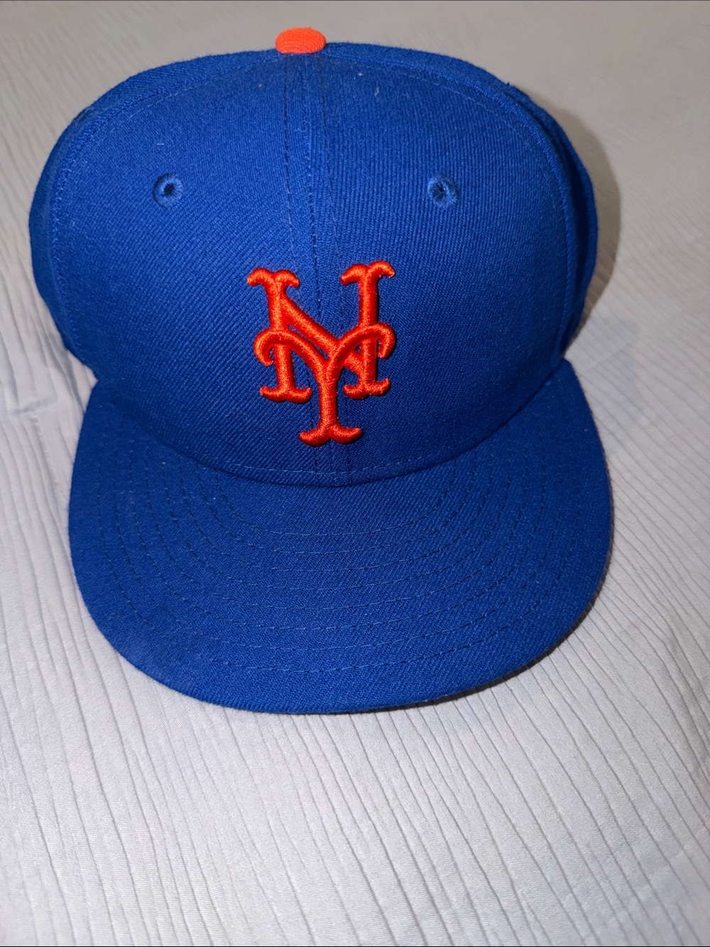 New Era Royal Blue Fitted Hat with Orange Logo